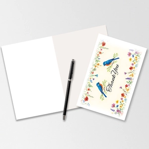 Detail of floral thank you card with watercolor birds on elegant marble background