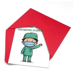 Close-up of a thank you card with medical cartoon illustration and red envelope