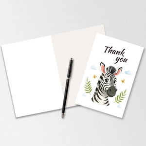 Detail view of cartoon zebra thank you card set with envelope and blank inner page