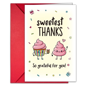 Detailed view of anniversary greeting card with cupcake illustration and red envelope