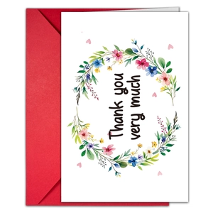 Floral thank you card with watercolor wreath design and matching red envelope