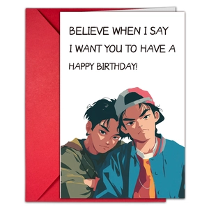 Detailed view of creative birthday card and red envelope with retro anime illustration