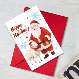 Large Christmas card set with Santa and sheep illustration plus a red envelope