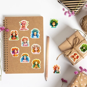 Detailed view of floral girl stickers used for decorating notebooks and gift boxes