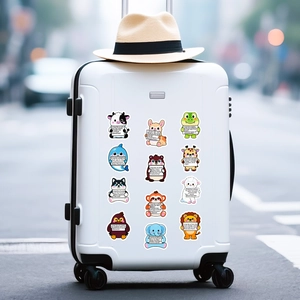 Cute cartoon animal stickers with motivational quotes on a white travel suitcase