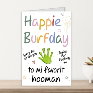 Creative Happy Birthday card with pet-themed puns on a rustic wooden shelf