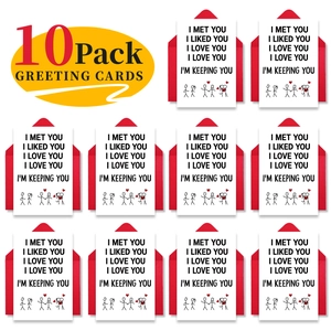 Vue à plat de cartes de Saint-Valentin avec enveloppes rouges et illustrations épurées