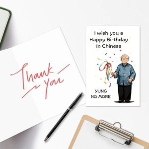 Creative birthday card and folded thank you card set with pen and office stationery props