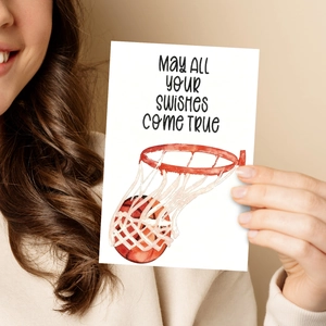 Detail of greeting card with basketball illustration and May all your swishes come true text
