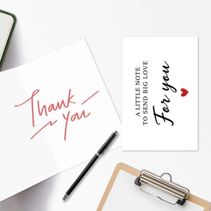 Minimalist paper thank you cards featuring elegant script and heart motif designs