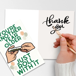 Greeting card set with humorous joint illustration and thank you note on white background