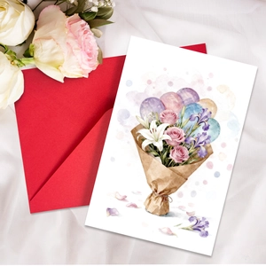 Macro detail of hand-painted floral greeting card with red envelope on white silk cloth