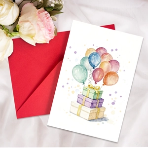 Detail of watercolor birthday card with balloon and gift illustration and red envelope