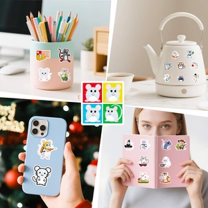 Waterproof cartoon mouse stickers applied to a water bottle, laptop, and phone case surfaces