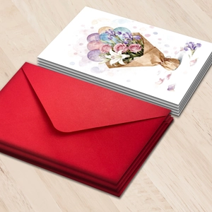 Floral watercolor greeting cards set with deep red envelopes on light wood background