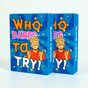 Detail view of Who Dares To Try party game boxes featuring vibrant cartoon illustrations