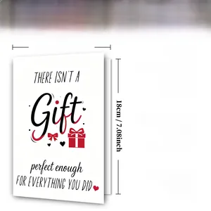 Detail view of 300GSM card showing 12x18cm dimensions and red bow gift box print