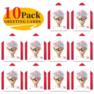 Flat lay of 10 pack watercolor flower greeting cards with red envelopes on white background