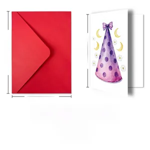 Detailed view of birthday card set with watercolor party hat and red envelope