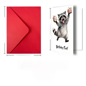 Detail showing oversized Happy Birthday card with watercolor raccoon illustration and red envelope