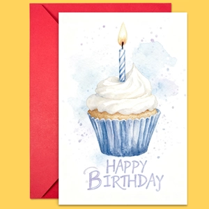 Close-up of watercolor birthday card with cupcake illustration and bright red envelope