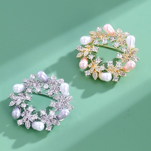 Elegant pearl floral wreath brooch with sparkling rhinestones in gold and silver finish