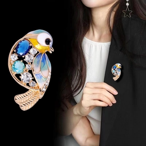 Broche oiseau exquise avec pierre bleue et finition émail pour mode féminine
