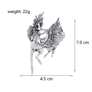 Vintage flying horse brooch in distressed silver finish with detailed feather textures