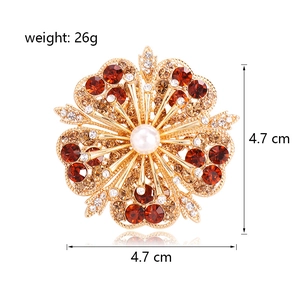 Exquisite gold flower brooch with red crystals, white pearl, and 4.7cm diameter