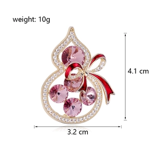 Broche gourde dorée avec nœud, pierres roses et cristaux, taille 4,1cm par 3,2cm