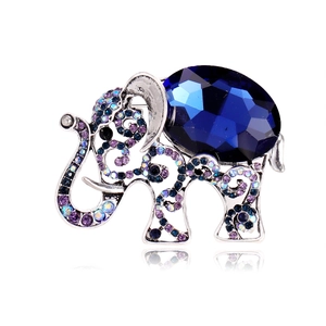 Silver vintage elephant brooch with a large blue oval stone and gradient rhinestones