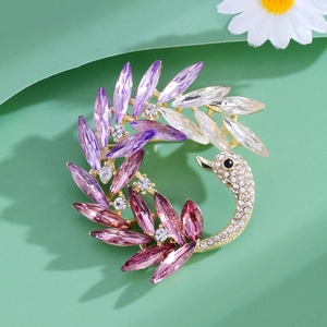 Elegant swan brooch with purple gradient crystals on a gold base for women