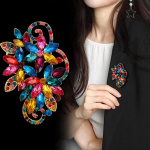 Luxurious multi-color crystal flower brooch on gold base with model display