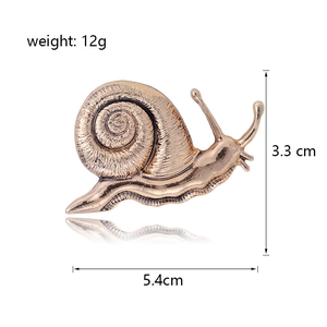 Broche escargot dorée vintage avec spirale, poids 12g, taille 5,4cm x 3,3cm