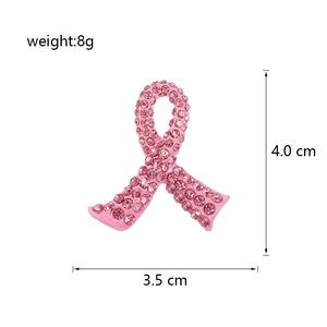 Tableau des tailles détaillé pour broche ruban rose montrant 4,0 cm par 3,5 cm