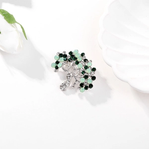 Silver tree brooch with green crystals and rhinestones for elegant coat styling