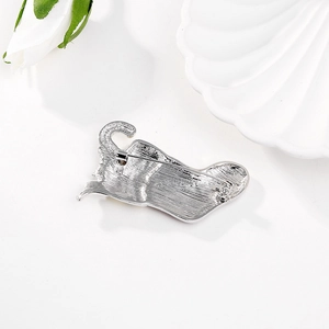 Detailed back view of Christmas stocking brooch with silver-plated alloy and pin clasp
