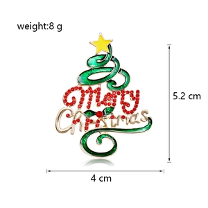Détail d'une broche sapin de Noël avec texte Merry Christmas et dimensions