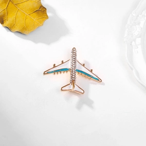 Exquisite airplane brooch with alloy gold plating, white enamel, and crystals for coats