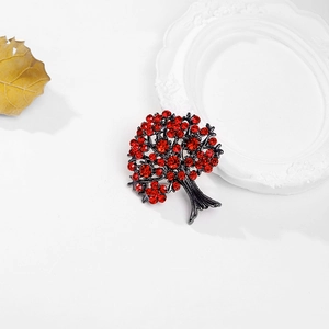 Broche arbre élégante avec cristaux rouge foncé et base en métal noir pour femmes