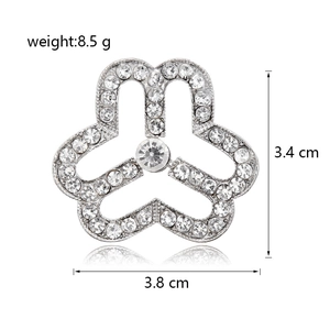 Silver crystal clover flower brooch pin with white rhinestones measuring 3.4x3.8cm