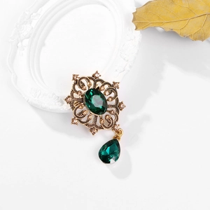 Vintage-Brosche aus Goldlegierung mit smaragdgrünem Stein und Strasssteinen
