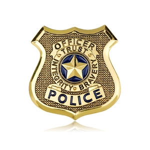 Close-up of golden police officer shield badge with blue enamel star and engraved text