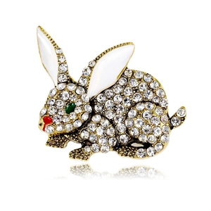 Charming rabbit brooch with sparkling rhinestones and golden finish in classic design