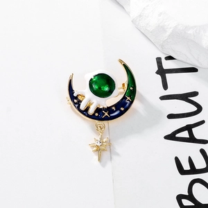 Cute astronaut on blue enamel moon brooch with gold star pendant and sparkling zircon