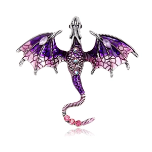 Broche dragon argentée vintage avec ailes en émail violet et strass scintillants
