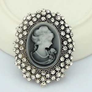 Vintage silver cameo brooch with lady profile and sparkling rhinestone border