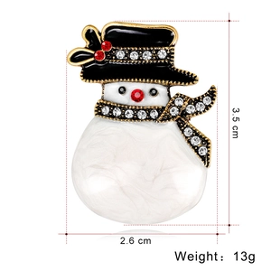 Sparkling rhinestone snowman brooch with enamel finish and holiday festive details