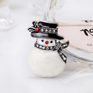 Minimalist snowman brooch with sparkling crystals and colorful enamel for Christmas