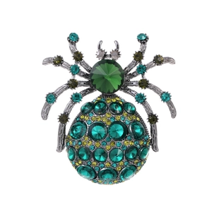 Broche araignée d'Halloween vintage avec gemme verte et strass jaunes brillants